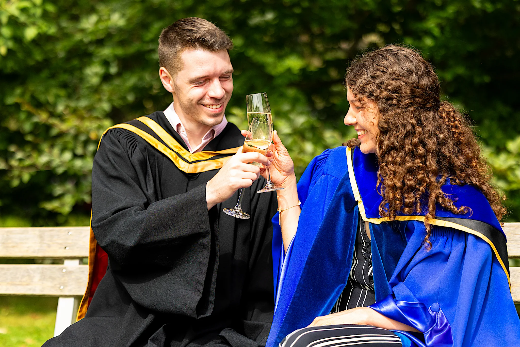 A couple toasting with champagne.